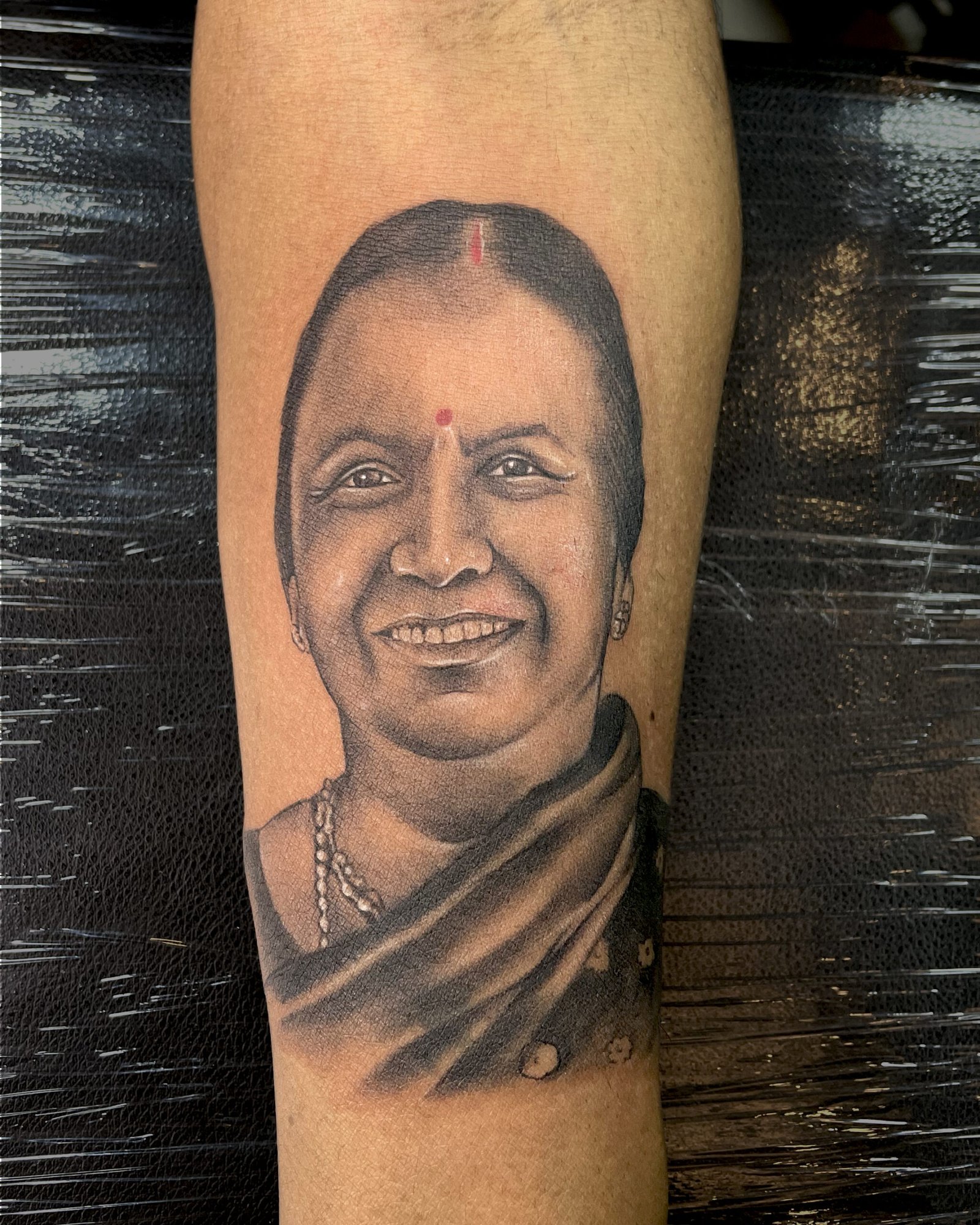Mom face tattoo